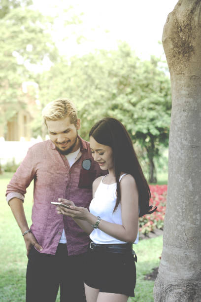 istock Lover enjoy their smart phone 665779490