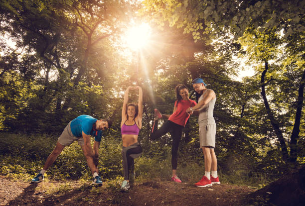 istock Young athletes spending a day in nature and exercising together. 665779798