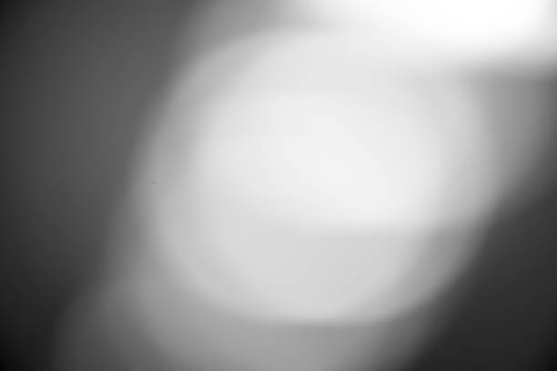 istock abstract background  bokeh lights in grey, Black and white picture. 665780562