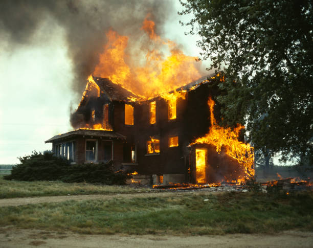 Fire Fire burning house stock pictures, royalty-free photos & images