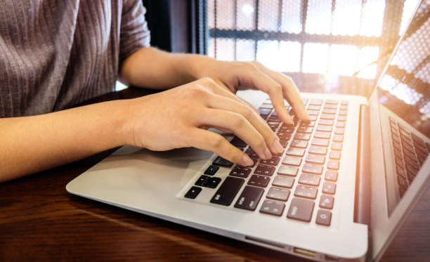 istock Woman office worker is typing keyboard 665810506