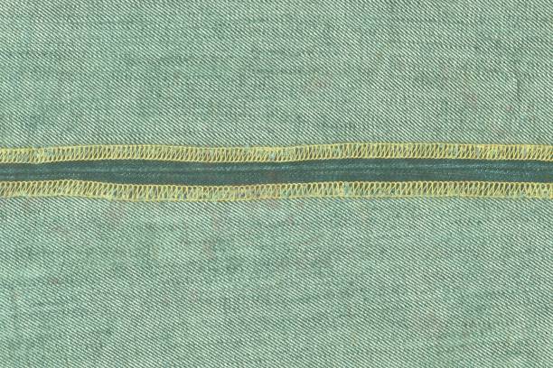 istock Pattern of green vintage overlock seam 665819668