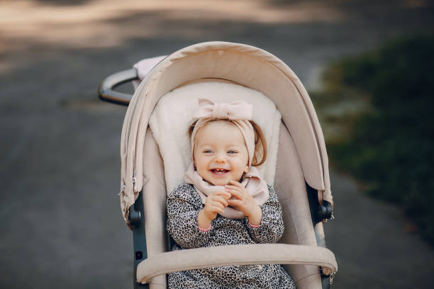 istock young family walking in the park 665819768