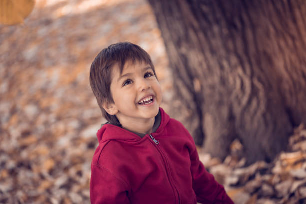 istock Cute little boy in public park 665819934