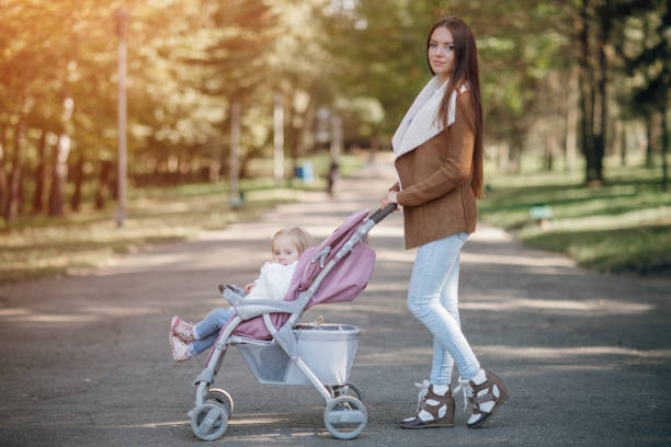 istock Family walk in the park 665824098