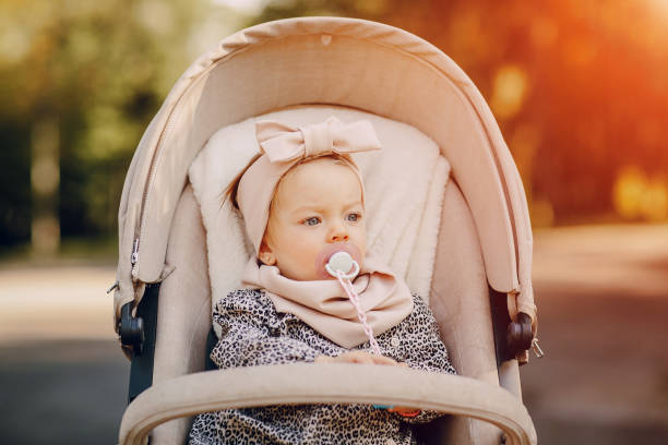 istock young family walking in the park 665839274