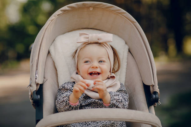 istock young family walking in the park 665842686