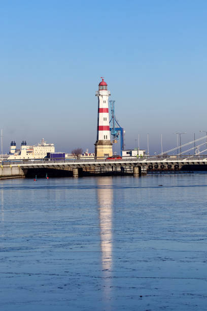 Sweden, Skane, Malmo, Lighthouse and cityscape