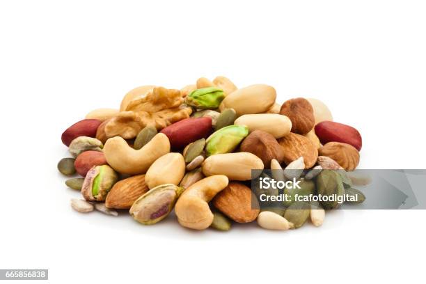 Mixed Nuts Heap On White Background Stock Photo - Download Image Now - Nut - Food, Variation, Seed