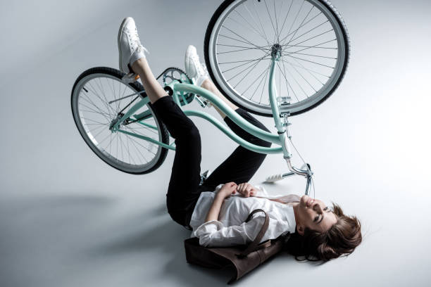 istock Young woman with bicycle 665866712