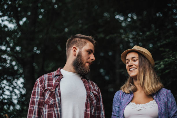 istock Two people are flirting in the forest 665871848
