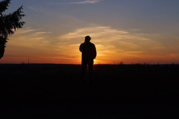 istock A man in the rays of the sunset 665872836