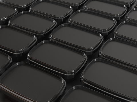 Black food containers on black background