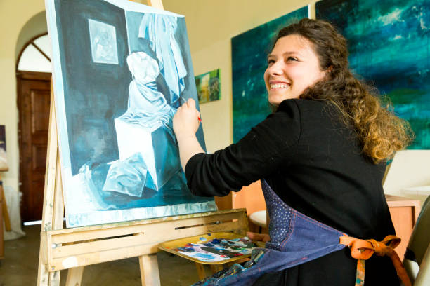 Fine art students painting