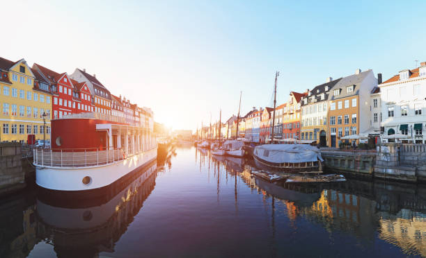 Tourists on Nyhavn waterfront in Copenhagen, Denmark on February 15, 2017