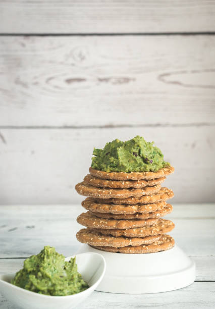 istock Sesame crispbread with guacamole 665907604