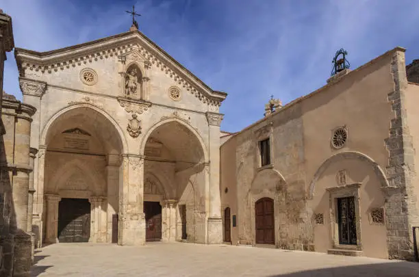 View of main facade of Saint Michael Archangel Sanctuary at Monte Sant'Angelo on Italy. Monte Sant'Angelo is a town on the slopes of Gargano promontory (Apulia).