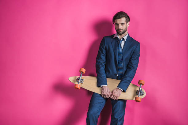 istock man in suit with skateboard 665931766