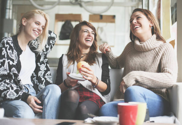 istock Three best friends in cafe. 665939030