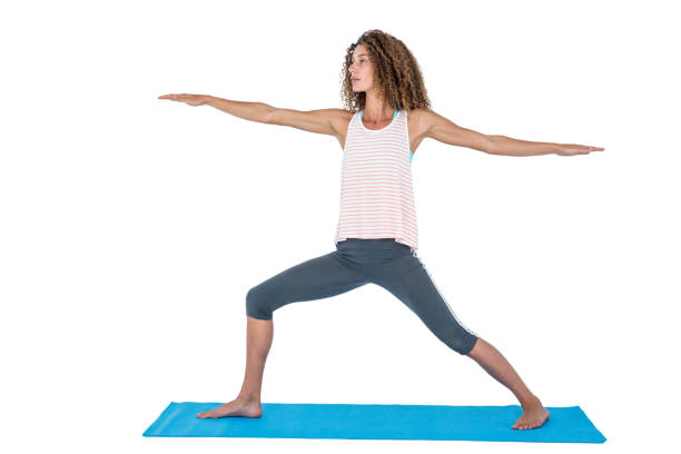 istock Young woman exercising with arms outstretched 665946562