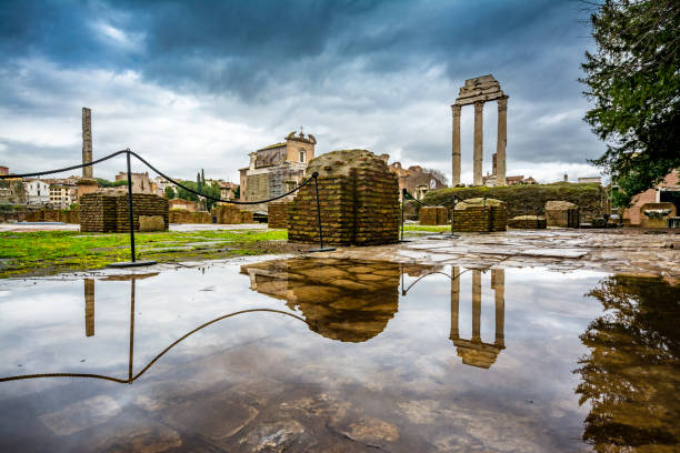 roman forum in rom - blue rain rome italy stock-fotos und bilder