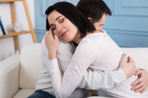istock Calm peaceful woman hugging her boyfriend 665953880