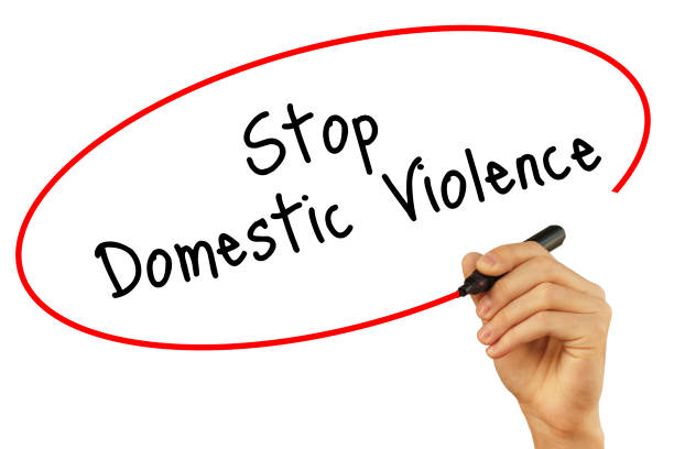 istock Man Hand writing Stop Domestic Violence with black marker on visual screen. Isolated on background. Business, technology, internet concept. Stock Photo 665985122