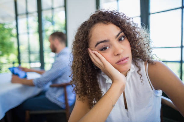 istock Upset woman sitting in a restaurant 665985468