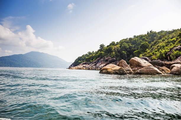 istock Rocks , sea and blue sky - Lipe island Thailand 665990698