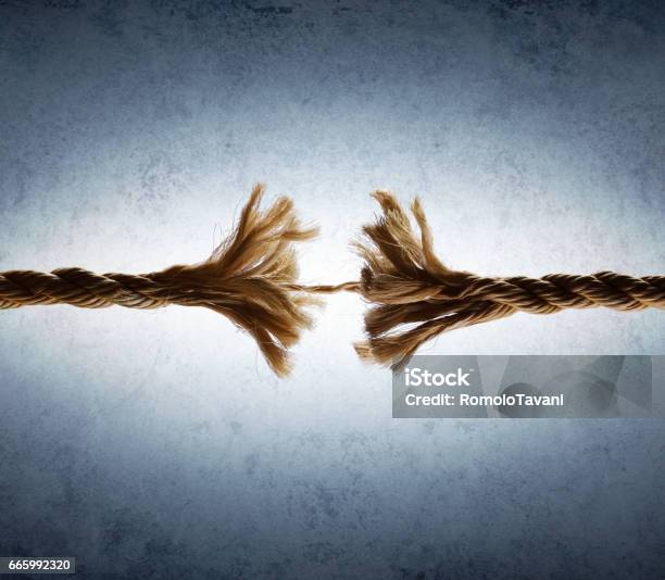 Rope Frayed In Tension Risk Of Breaking Stock Photo - Download Image Now - Rope, Broken, Breaking