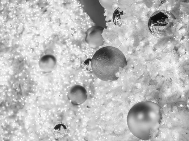 istock Closeup of Christmas balls and artificial pine branches.Black&White tone 665996346