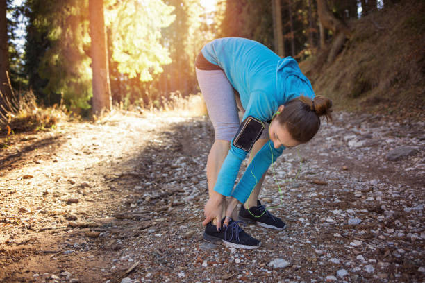 istock Girl exercising in the nature 665996580