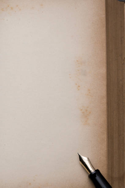 istock Antique book and pen 666002278