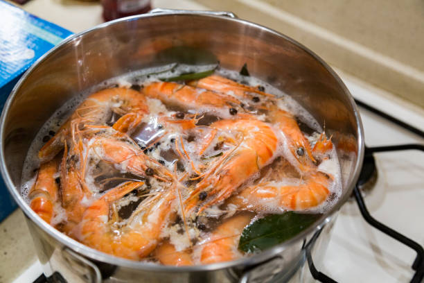 istock Large tiger shrimps are cooked in a saucepan 666002630