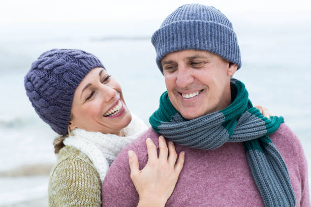 istock Smiling happy couple hugging each other 666004210