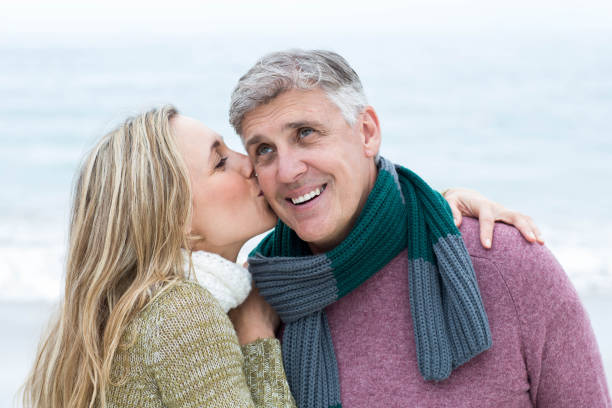 istock Smiling happy couple hugging each other 666009188