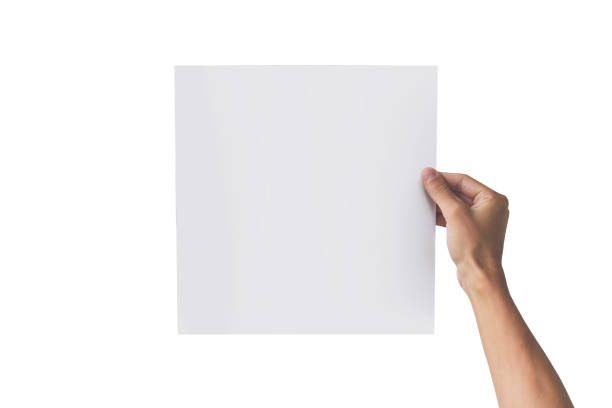 istock Two hands holding square paper in the right hand. Leaflet presentation. Pamphlet hand man. Man show offset paper. Sheet template. Book in hands. Booklet folding design. Fold paper sheet display read. 666025374