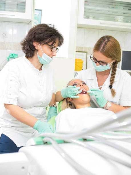 istock Girl having a dental examination 666030660