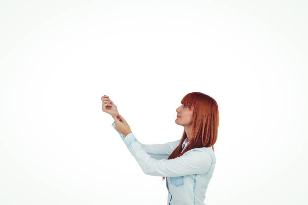istock Smiling hipster woman pointing something 666030672