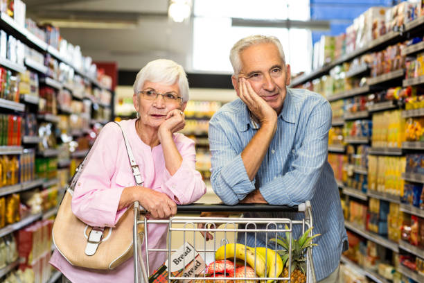 istock Senior couple shopping together 666030920