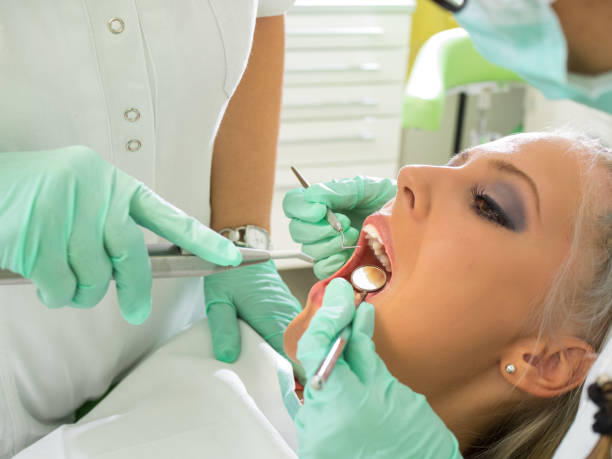 istock Girl having a dental examination 666030986