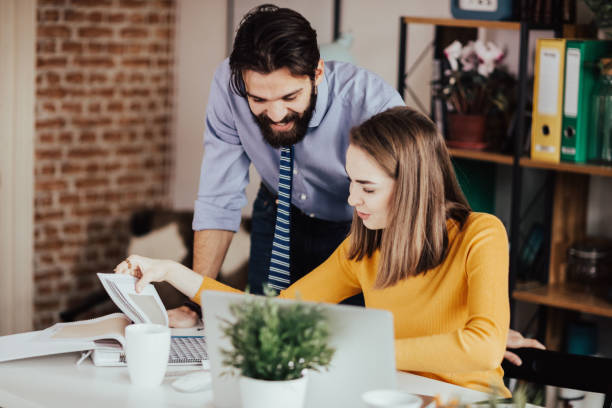 istock Colleagues are choosing color for their walls 666031144