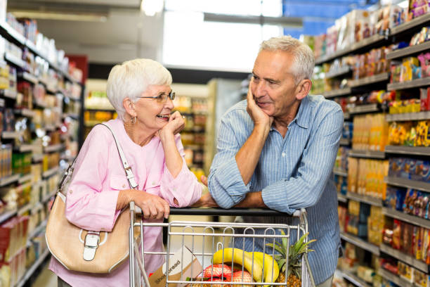 istock Senior couple shopping together 666031152