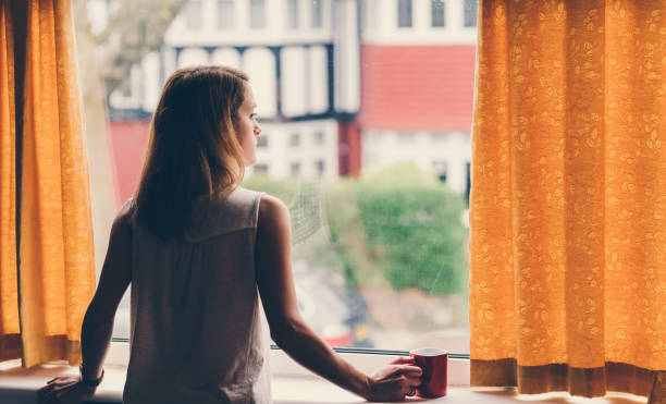 istock Depressed woman at home 666031934