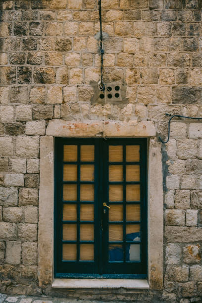 istock Old blue doors. Wood texture. Texture of metal 666037950