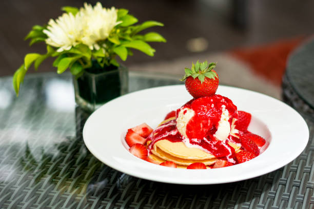 istock Pancake and ice cream into white dish 666040160