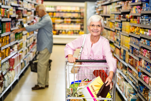 istock Senior woman picking out product 666041314