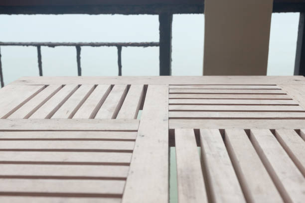 istock wood table at the seaside 666047512
