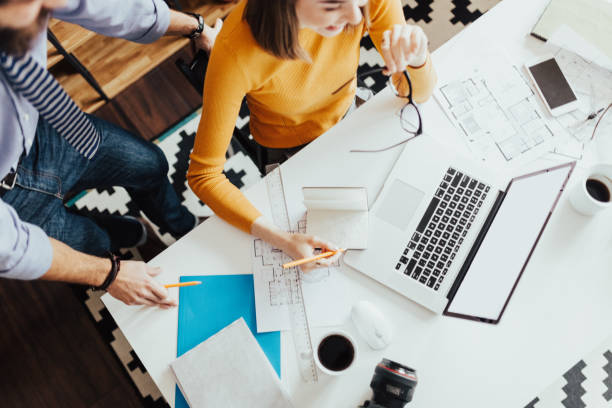 istock Top view of the two persons working together 666050462