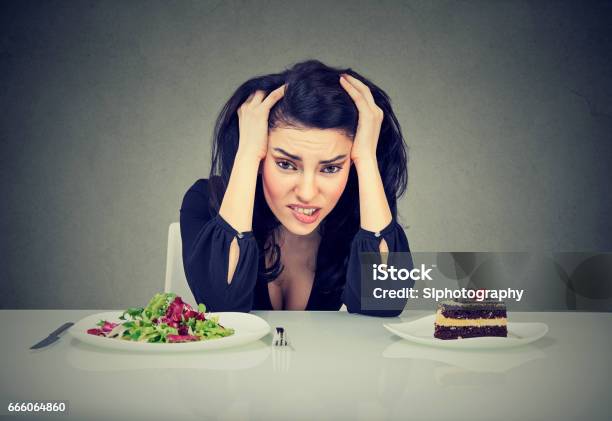 Woman Tired Of Diet Restrictions Stock Photo - Download Image Now - Food, Craving, Temptation